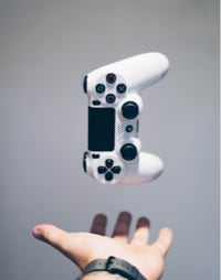 Hand catching video game console controller